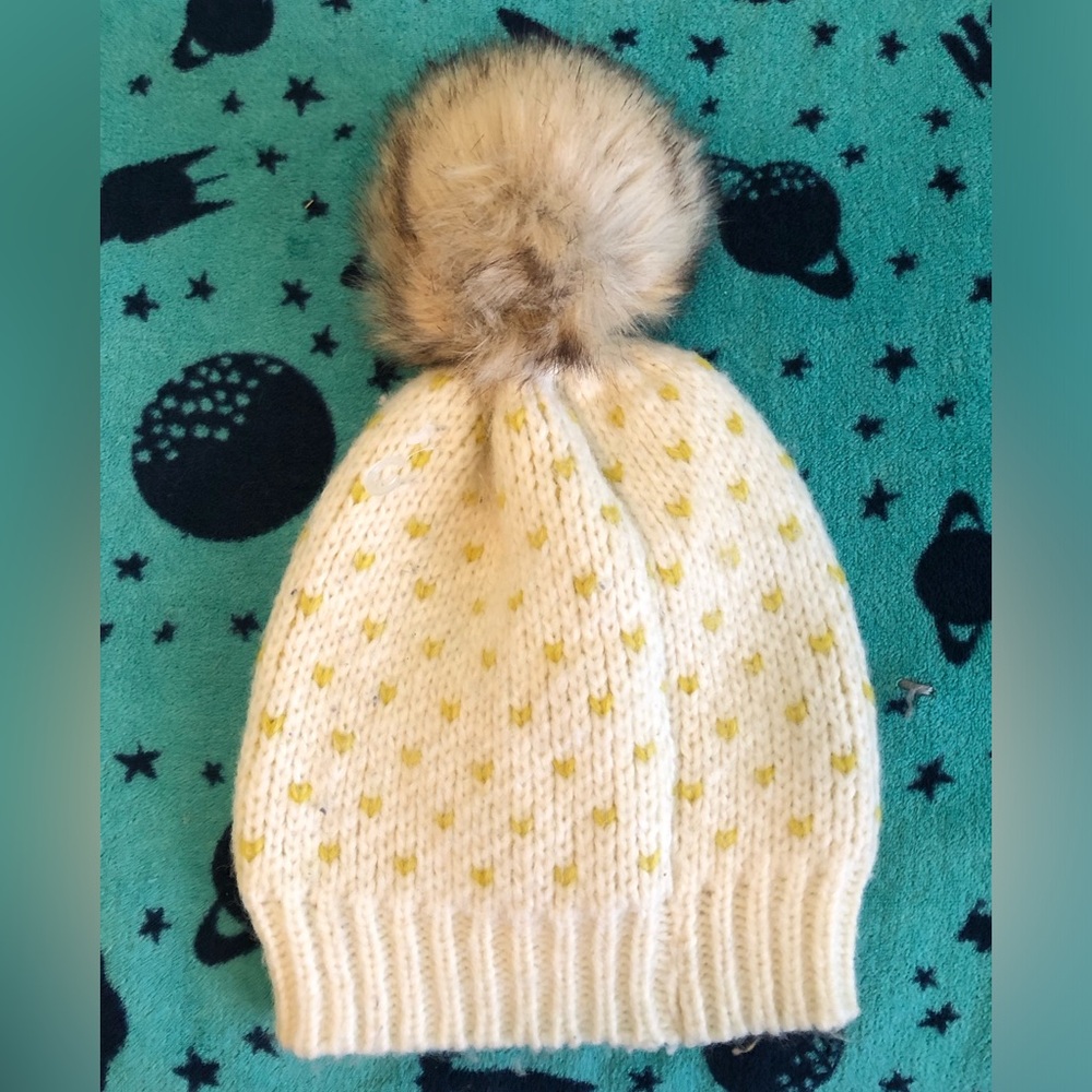 eerie off white and yellow beanie with pompom one size fits most